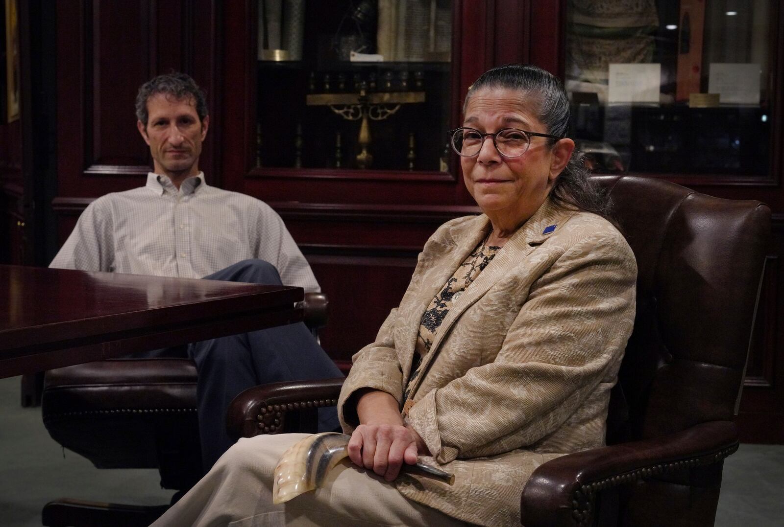 Rabbi Seth Adelson of Congregation Beth Shalom, sits for a portrait with Audrey Glickman, a Tree of Life member who survived the 2018 synagogue attack, Friday, Sept. 27, 2024, in Pittsburgh. (AP Photo/Jessie Wardarski)