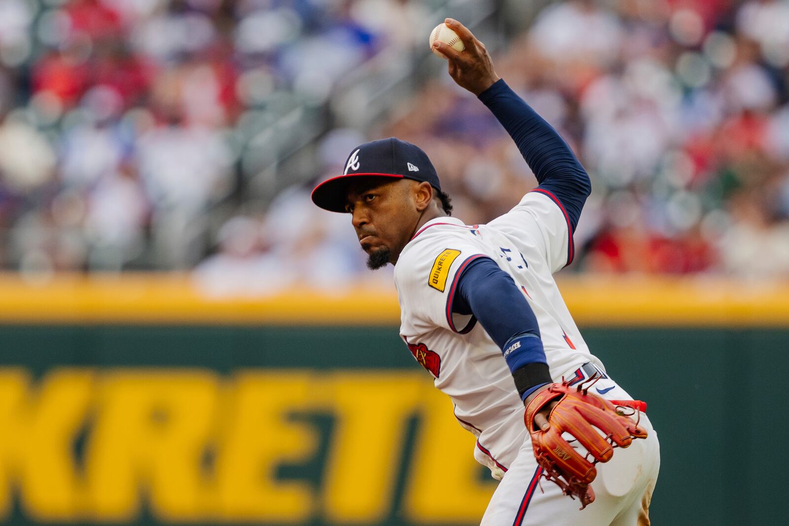 Atlanta Braves second baseman Ozzie Albies throws out New York Mets' Jose Iglesias at first base in the sixth inning of a baseball game, Monday, Sept. 30, 2024, in Atlanta. (AP Photo/Jason Allen)