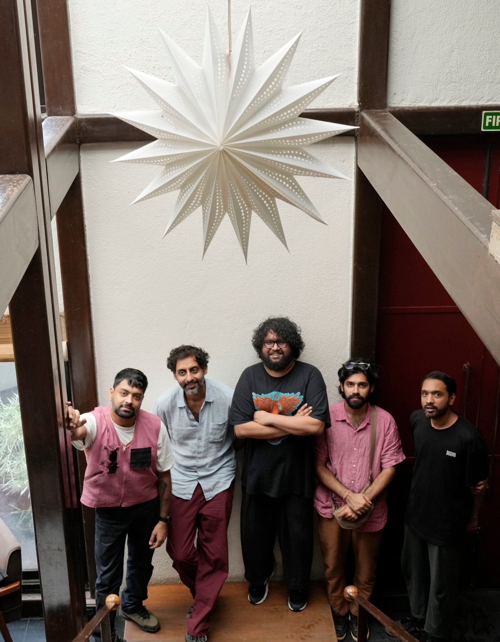 From left, Karan Singh, Suryakant Sawhney, Kartik Pillai,Dhruv Bhola, and Rohit Gupta from Peter Cat Recording Co pose for a photograph in Mumbai, India, Friday, Aug. 2, 2024. (AP Photo/Rajanish Kakade)