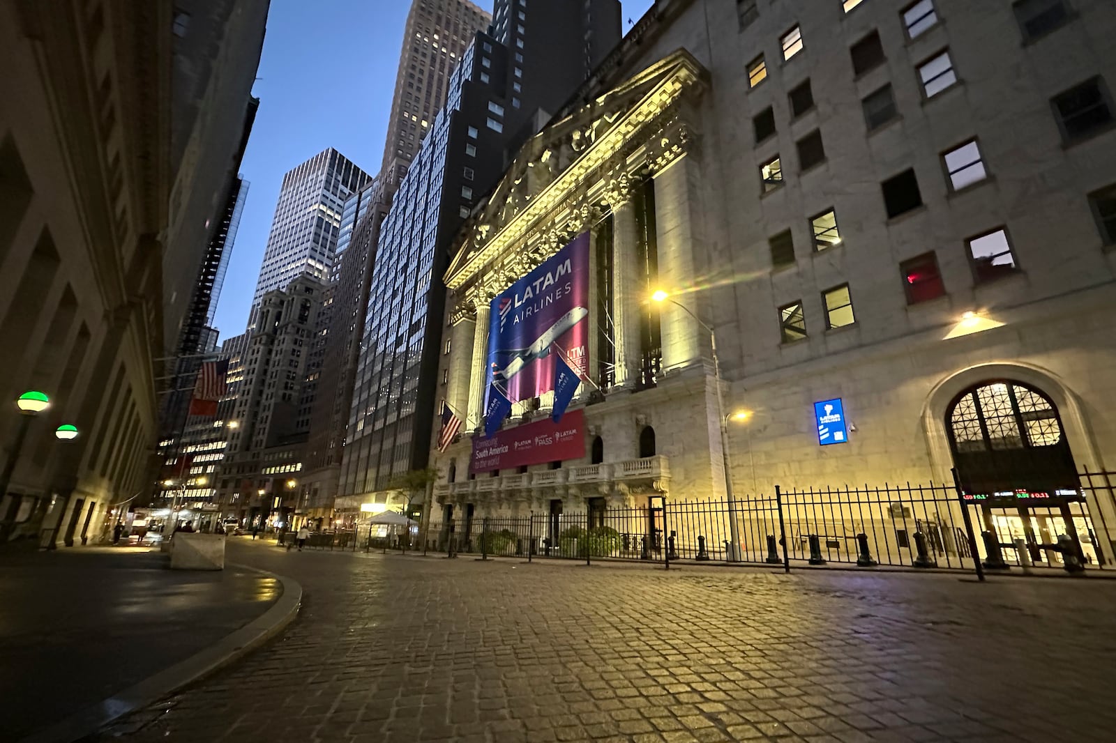 A banner for LATAM Airlines hangs from the front of the New York Stock Exchange on Tuesday, Oct. 22, 2024, in New York. (AP Photo/Peter Morgan)