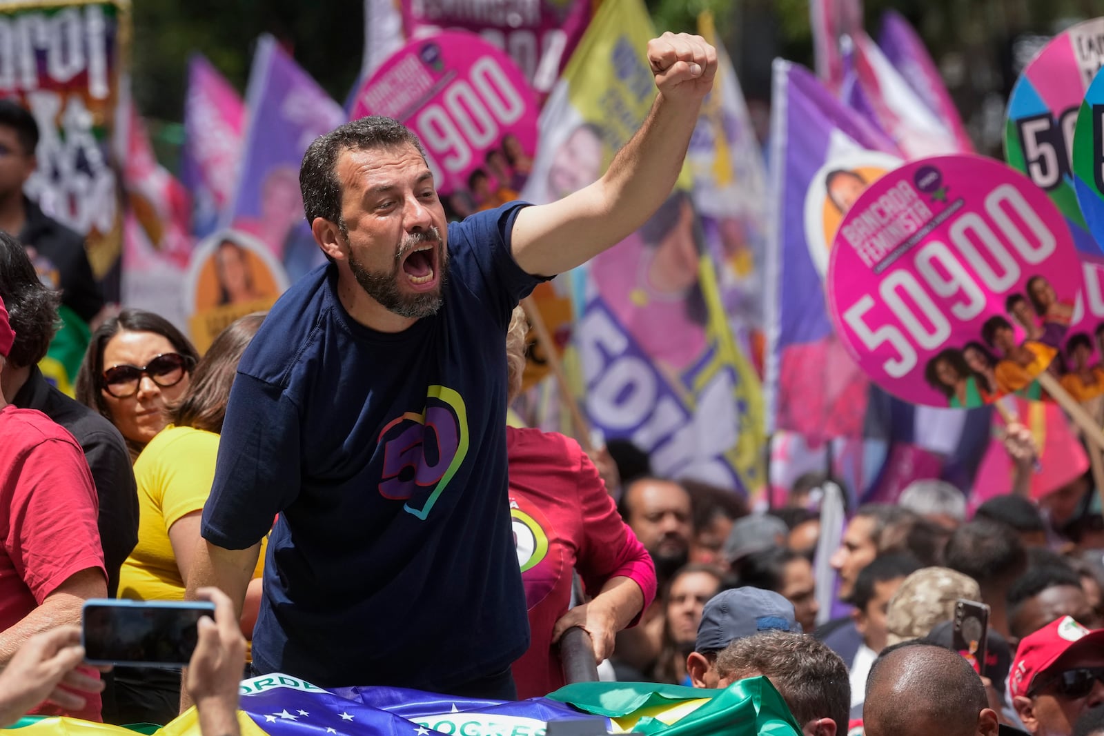 Mayoral candidate Guilherme Boulos of the Socialism and Liberty Party campaigns the day before elections in Sao Paulo, Saturday, Oct. 5, 2024. (AP Photo/Andre Penner)