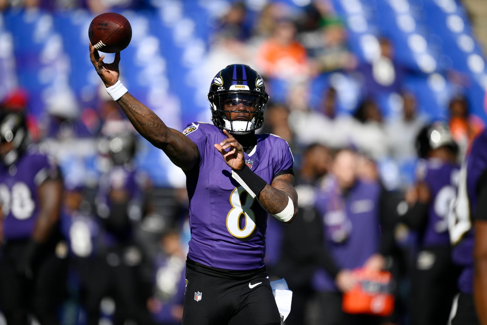 Baltimore Ravens quarterback Lamar Jackson warms up before an NFL football game against the Denver Broncos Sunday, Nov. 3, 2024, in Baltimore. (AP Photo/Nick Wass)