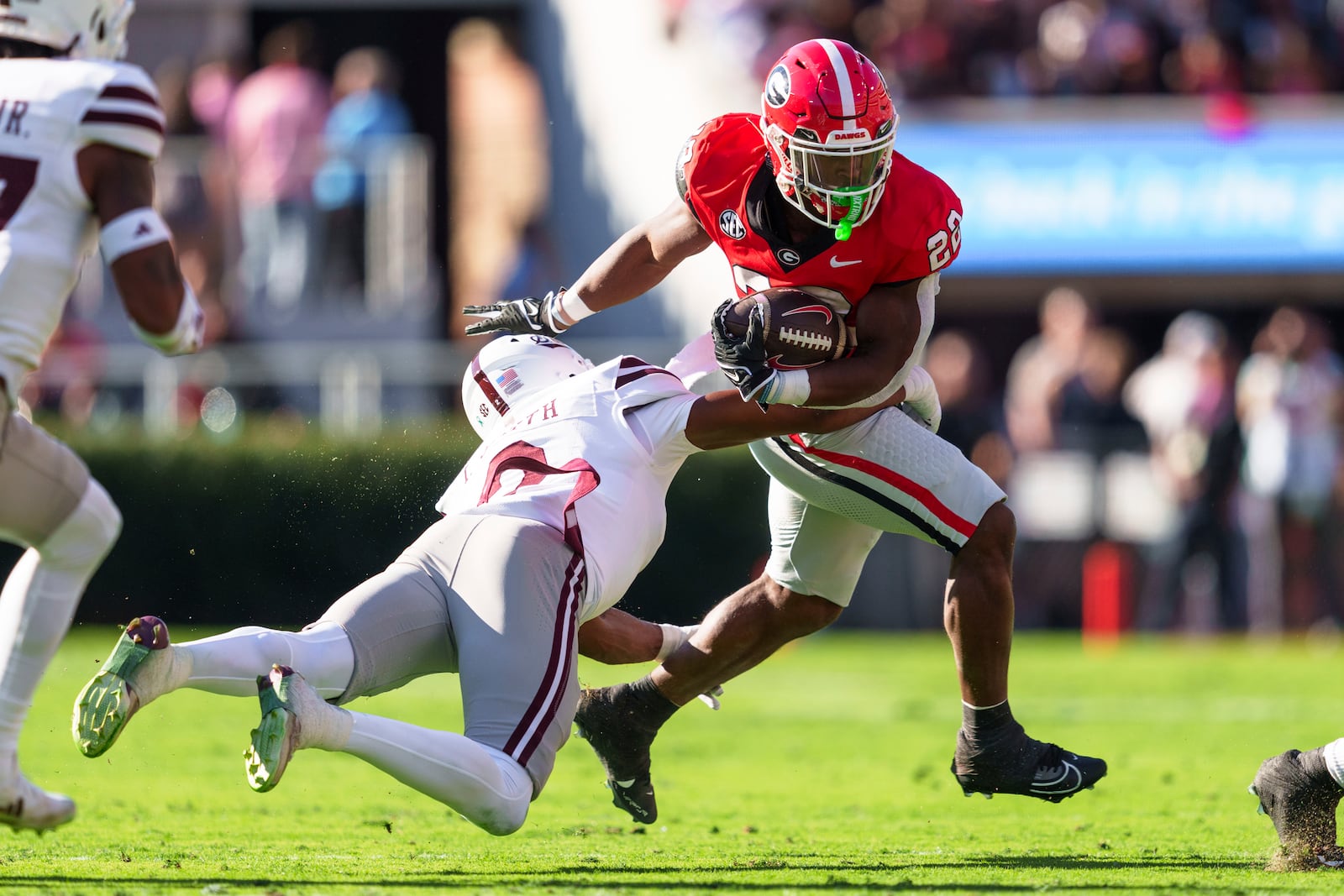 Georgia running back Branson Robinson (22) runs the ball during an NCAA college football game against Mississippi State, Saturday, Oct. 12, 2024, in Athens, Ga. (AP Photo/Jason Allen)