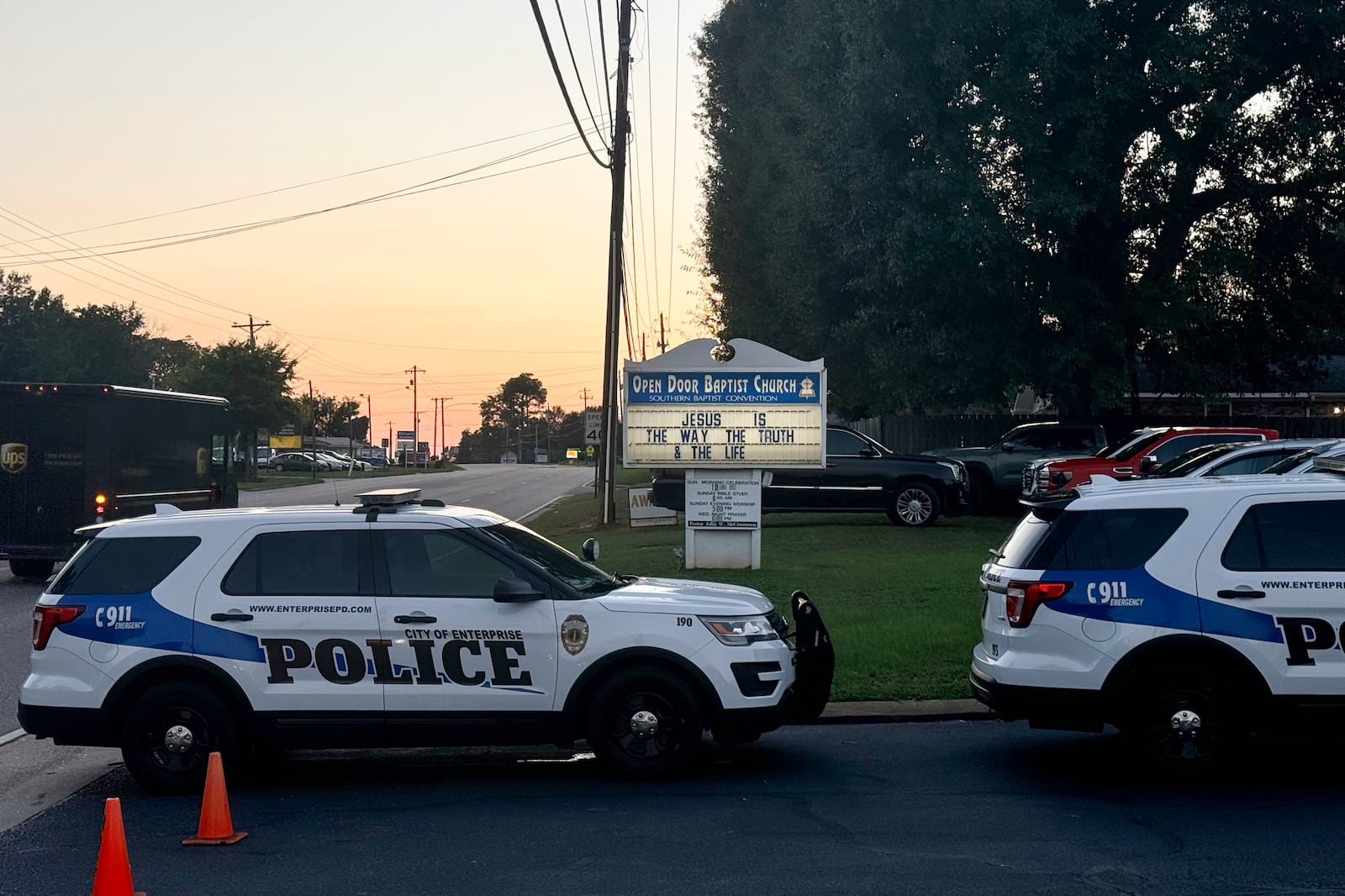 A sign at Open Door Baptist Church, where residents gather to discuss a recent increase in Haitian migrants in the area, is pictured in Enterprise, Ala., Sept. 19, 2024. (AP Photo/Safiyah Riddle)