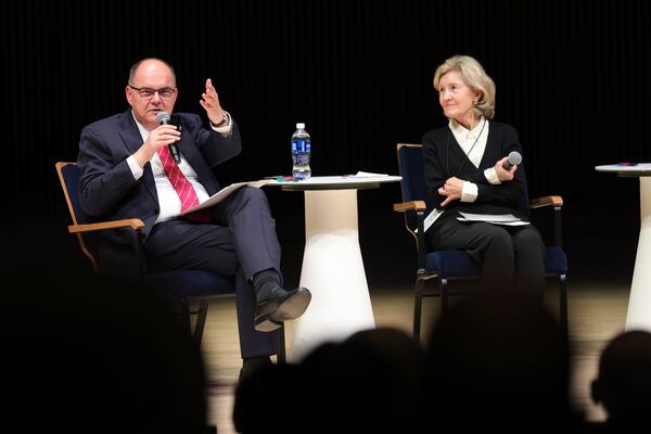 High Representative for Bosnia and Herzegovina Christian Schmidt, left, speaks with former U.S. Ambassador to NATO and U.S. Senator Kay Bailey Hutchison during a panel discussion at the NATO Parliamentary Assembly in Dayton, Ohio, Friday, May 23, 2025. (AP Photo/Paul Vernon)