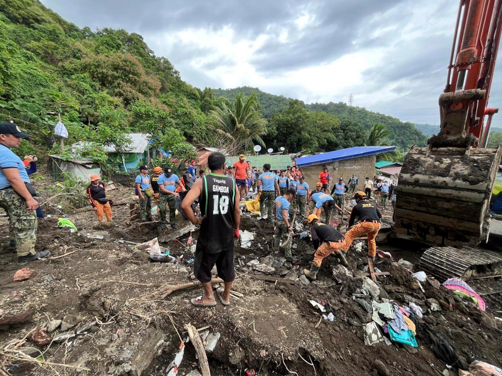 Volunteers continue rescue operations after a recent landslide triggered by Tropical Storm Trami struck Talisay, Batangas province, Philippines leaving thousands homeless and several villagers dead on Saturday, Oct. 26, 2024. (AP Photo/Jim Gomez)