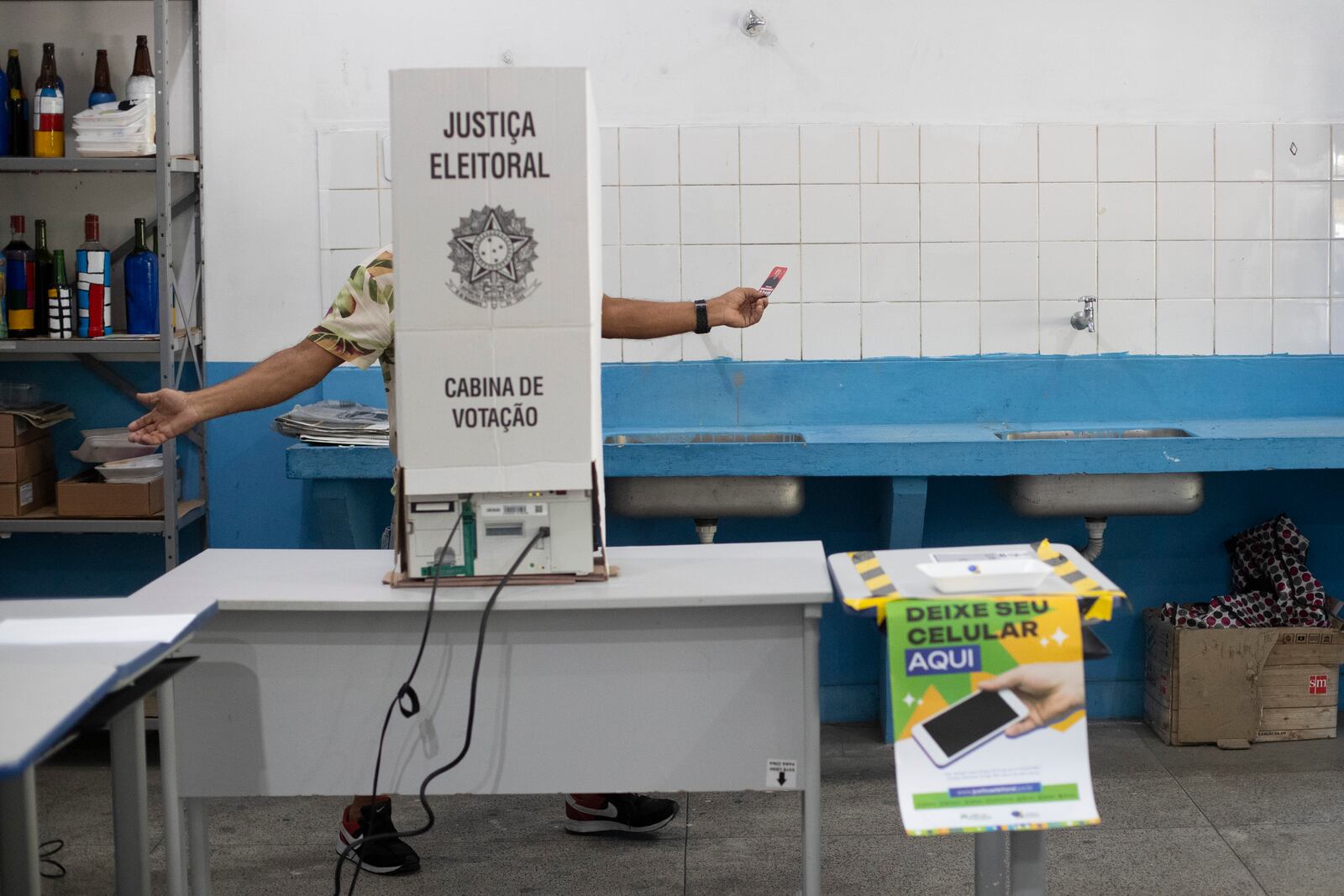 A man votes in municipal elections in Rio de Janeiro, Sunday, Oct. 6, 2024. (AP Photo/Bruna Prado)