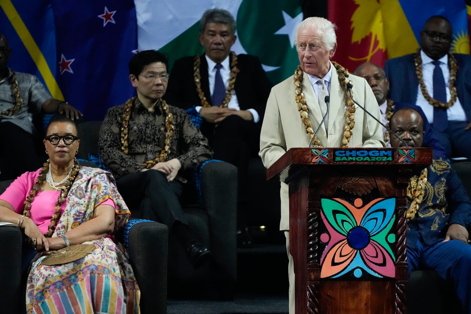 Britain's King Charles addresses the opening ceremony for the Commonwealth Heads of Government meeting in Apia, Samoa, Friday, Oct. 25, 2024. (AP Photo/Rick Rycroft/Pool)