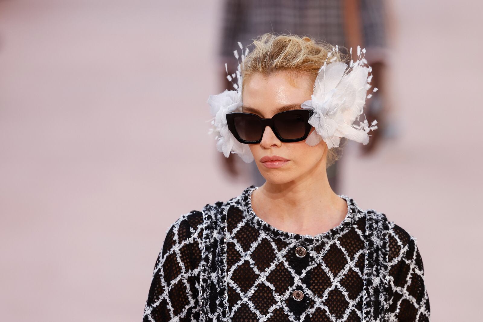 Stella Maxwell wears a creation as part of the Chanel Spring/Summer 2025 collection presented Tuesday, Oct. 1, 2024, in Paris. (Photo by Vianney Le Caer/Invision/AP)