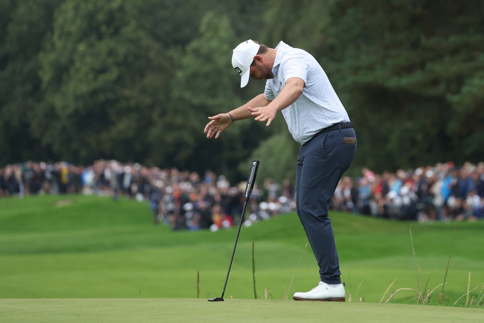 Thirston Lawrence of South Africa reacts to his putt on the 18th green during the final round of the British PGA golf Championship at Wentworth golf club in Wentworth, England, Sunday, Sept. 22, 2024. (AP Photo/Ian Walton)