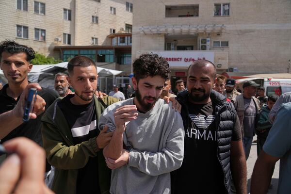 Freed Palestinian prisoner Mohammad Hijazi, who was detain by the Israeli army during its ground operation in the Gaza Strip, arrives at al-Aqsa Hospital in Deir al-Balah, central Gaza, after his release from an Israeli prison, Tuesday, April 29, 2025. (AP Photo/Abdel Kareem Hana)
