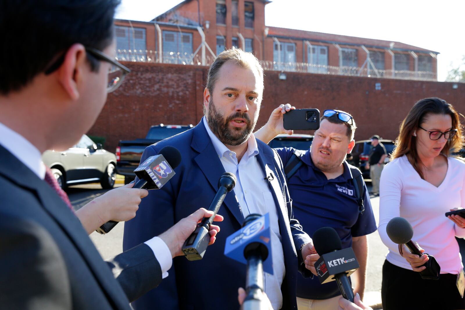 Texas State Rep. John Bucy III speaks to reporters on the pending execution of Robert Roberson during an impromptu press conference outside of the Huntsville Unit of the Texas State Penitentiary, Thursday, Oct. 17, 2024, in Huntsville, Texas. (AP Photo/Michael Wyke)