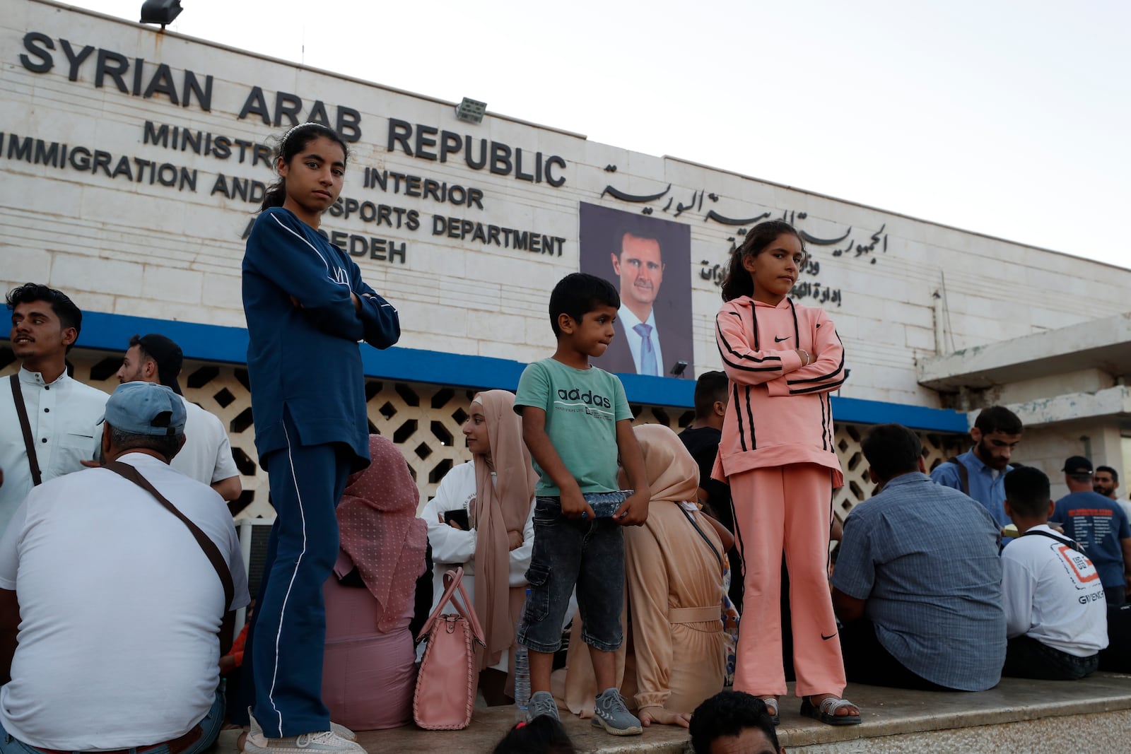 Syrians fleeing the war in Lebanon, arrive at the Syrian-Lebanese border crossing in Jdeidet Yabous, Syria, Wednesday, Sept. 25, 2024. (AP Photo/Omar Sanadiki)