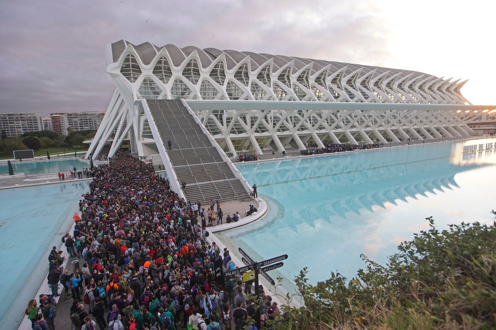 Thousands of volunteers show up at the City of Arts and Sciences cultural complex to be assigned work schedules to help with the clean up operation after floods in Valencia, Spain, Saturday, Nov. 2, 2024. (AP Photo/Alberto Saiz)