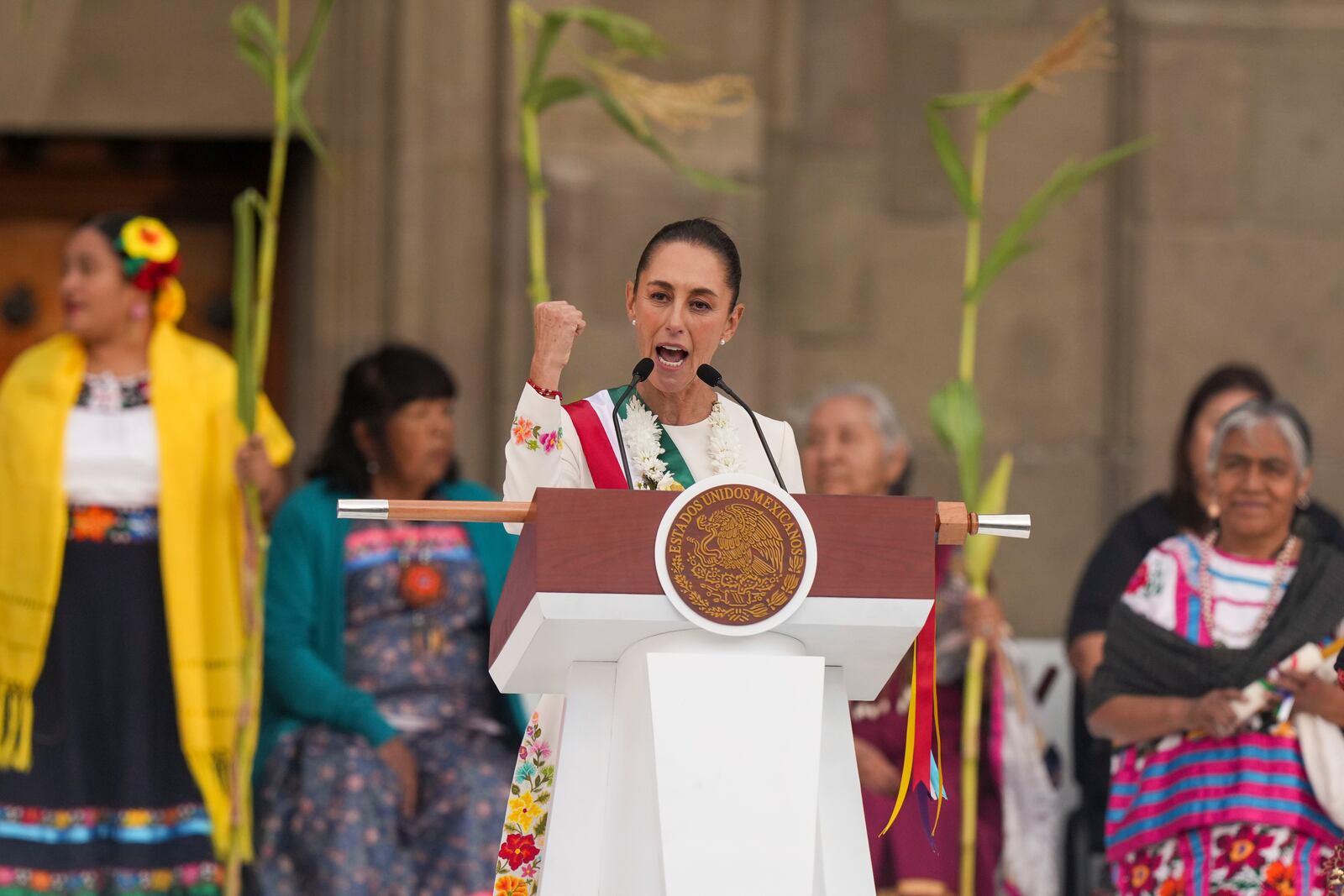 President Claudia Sheinbaum addresses supporters in the Zócalo, Mexico City's main square, on her inauguration day, Tuesday, Oct. 1, 2024. (AP Photo/Fernando Llano)