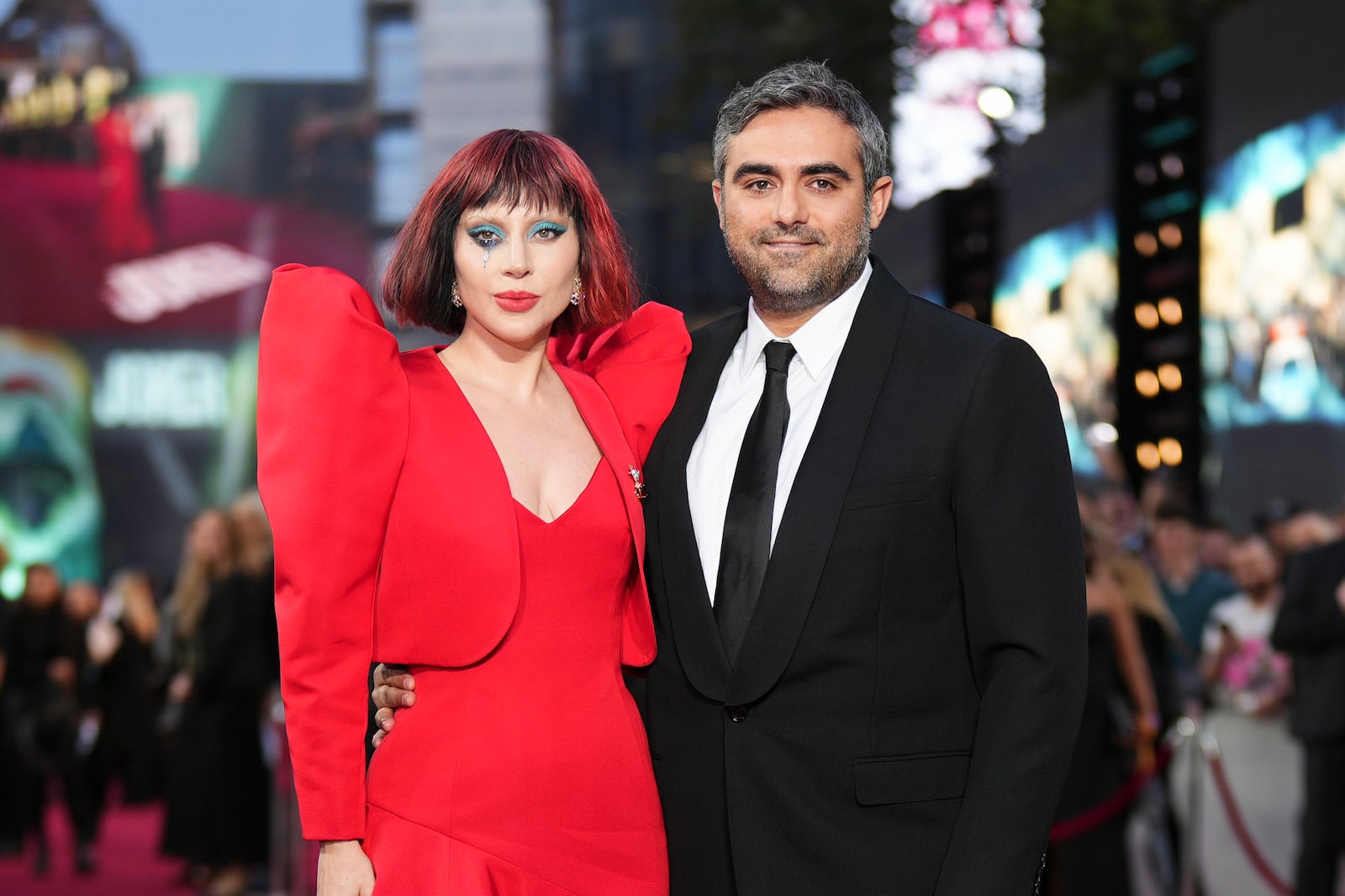 Lady Gaga, left, and Michael Polansky pose for photographers upon arrival at the premiere for the film 'Joker: Folie A Deux' on Wednesday, Sept. 25, 2024, in London. (Photo by Scott A Garfitt/Invision/AP)