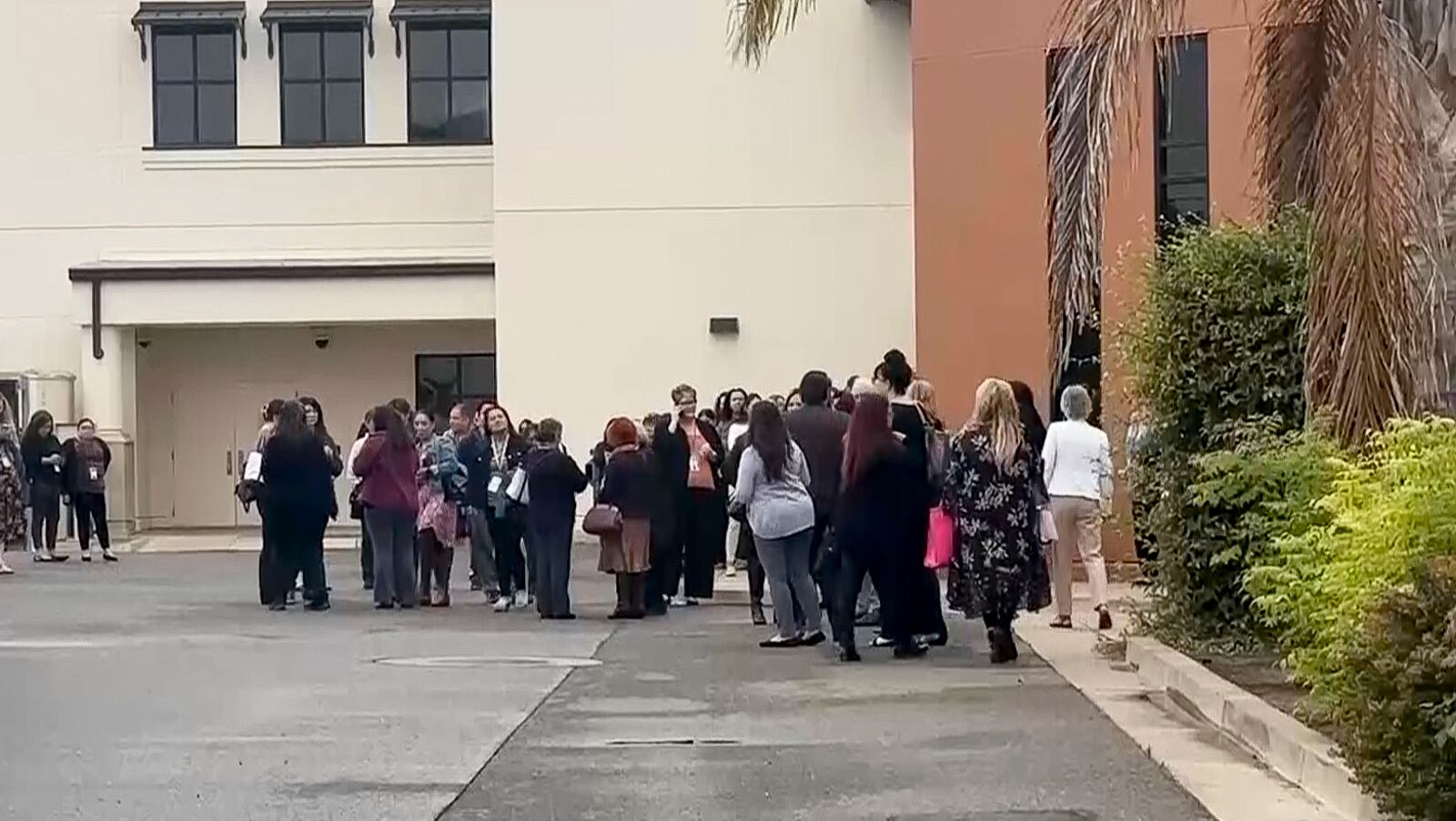 In this still image from video provided by KEYT, people gather following an explosion at the Santa Maria Courthouse in Santa Maria, Calif., Wednesday, Sept. 25, 2024. (KEYT via AP)