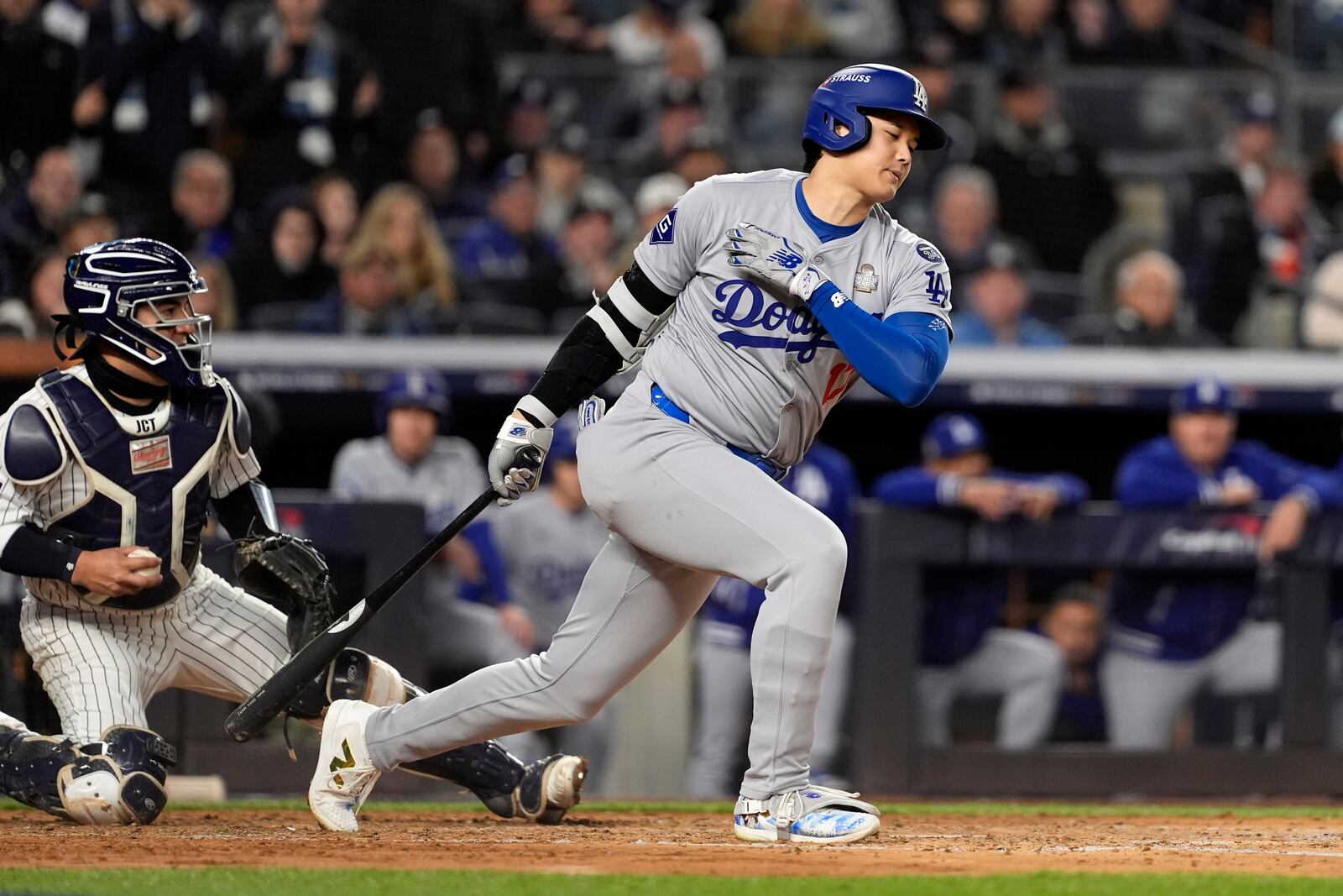 Los Angeles Dodgers' Shohei Ohtani strikes out against the New York Yankees during the fourth inning in Game 3 of the baseball World Series, Monday, Oct. 28, 2024, in New York. (AP Photo/Godofredo A. Vásquez)