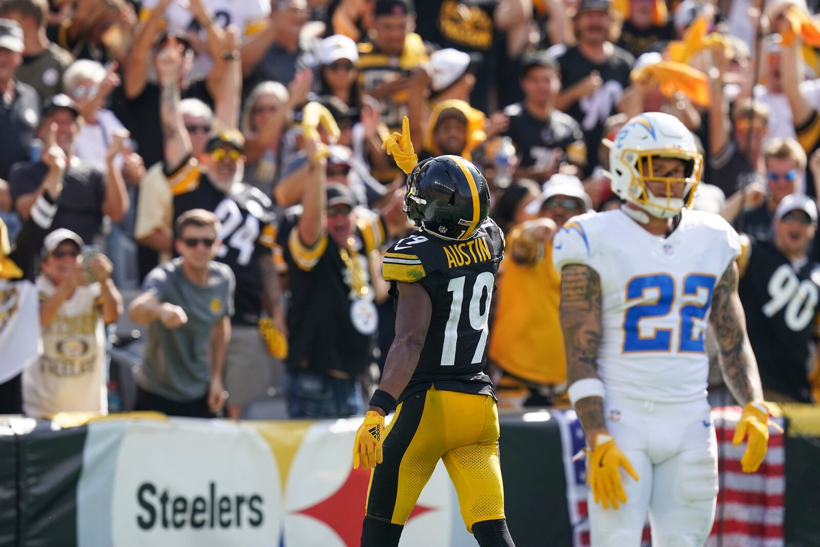 Pittsburgh Steelers wide receiver Calvin Austin III (19) celebrates after scoring a touchdown during the second half of an NFL football game against the Los Angeles Chargers, Sunday, Sept. 22, 2024, in Pittsburgh. (AP Photo/Matt Freed)