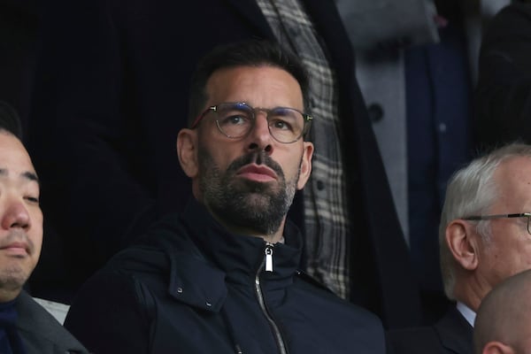 Ruud van Nistelrooy sits in the stands during the Premier League match at the Gtech Community Stadium, Brentford on Saturday Nov. 30, 2024. (Steven Paston/PA via AP)