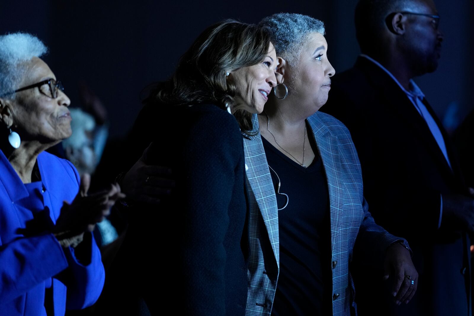 Democratic presidential nominee Vice President Kamala Harris, center, hugs bishop Rosie O'neal, during a church service at Koinonia Christian Center in Greenville, N.C., Sunday, Oct. 13, 2024. (AP Photo/Susan Walsh)