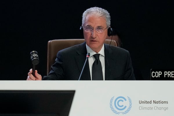 Mukhtar Babayev, COP29 President, bangs a gavel during a plenary session at the COP29 U.N. Climate Summit, Monday, Nov. 18, 2024, in Baku, Azerbaijan. (AP Photo/Rafiq Maqbool)