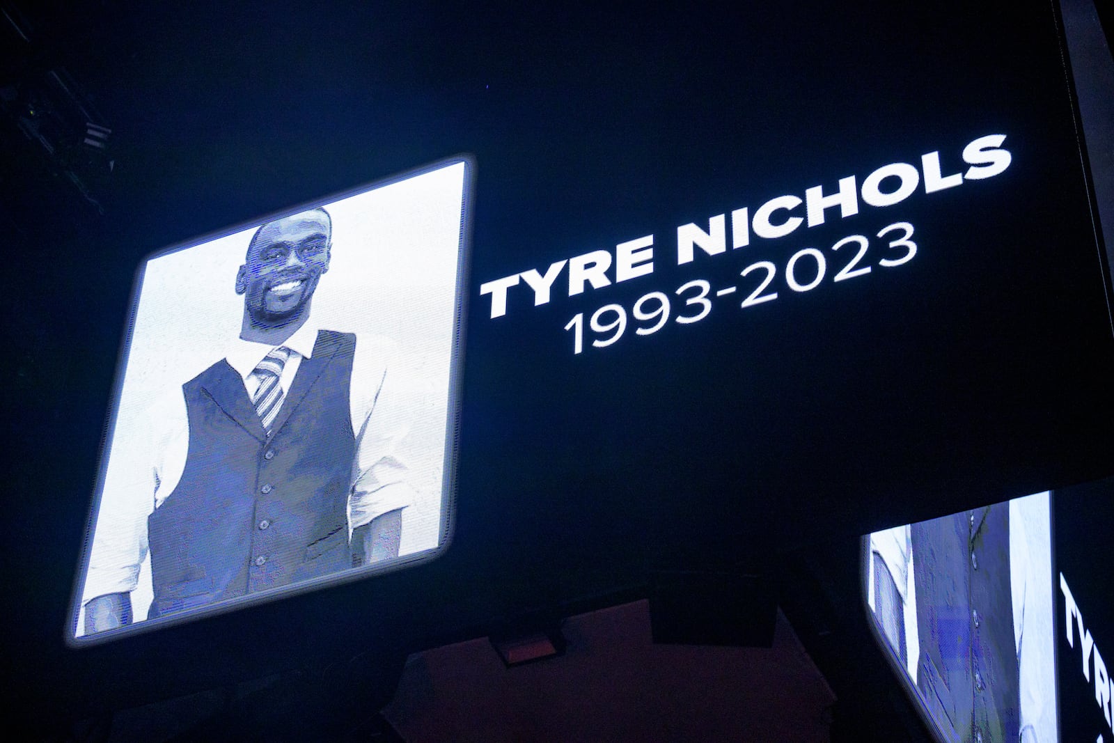 FILE - The screen at the Smoothie King Center in New Orleans honors Tyre Nichols before an NBA basketball game between the New Orleans Pelicans and the Washington Wizards, Jan. 28, 2023. (AP Photo/Matthew Hinton, File)