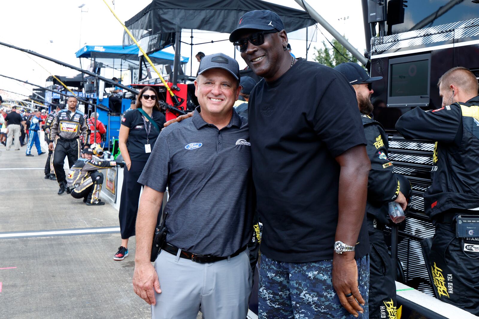 FILE - Bob Jenkins, owner of Front Row Motorsports, and Michael Jordan, co-owner of 23XI Racing, pose before a NASCAR Cup Series auto race at Talladega Superspeedway, Oct. 6, 2024, in Talladega, Ala. (AP Photo/Butch Dill, File)