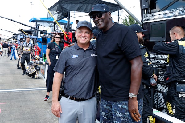 FILE - Bob Jenkins, owner of Front Row Motorsports, and Michael Jordan, co-owner of 23XI Racing, pose before a NASCAR Cup Series auto race at Talladega Superspeedway, Oct. 6, 2024, in Talladega, Ala. (AP Photo/Butch Dill, File)