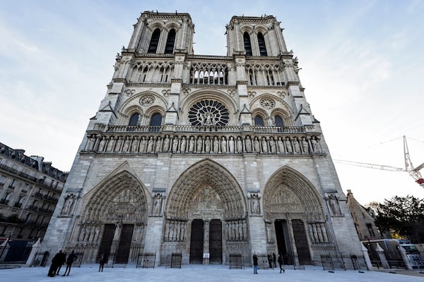 The facade of Notre-Dame de Paris cathedral in Paris, is seen Friday Nov. 29, 2024, ahead of French President Emmanuel Macron's final visit to the construction site to see the restored interiors. (Stephane de Sakutin, Pool via AP)