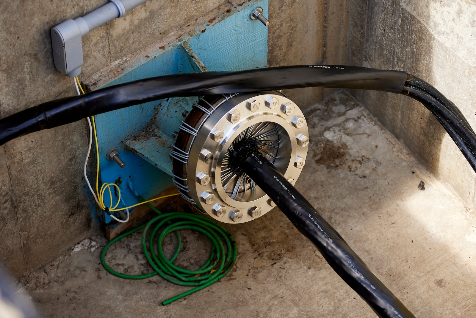 Concrete vaults under the parking lot at Driftwood State Beach where subsea cables connected to the wave energy test site arrive on land and connect to land cables in Newport, Ore., Friday, Aug. 23, 2024. (AP Photo/Craig Mitchelldyer)