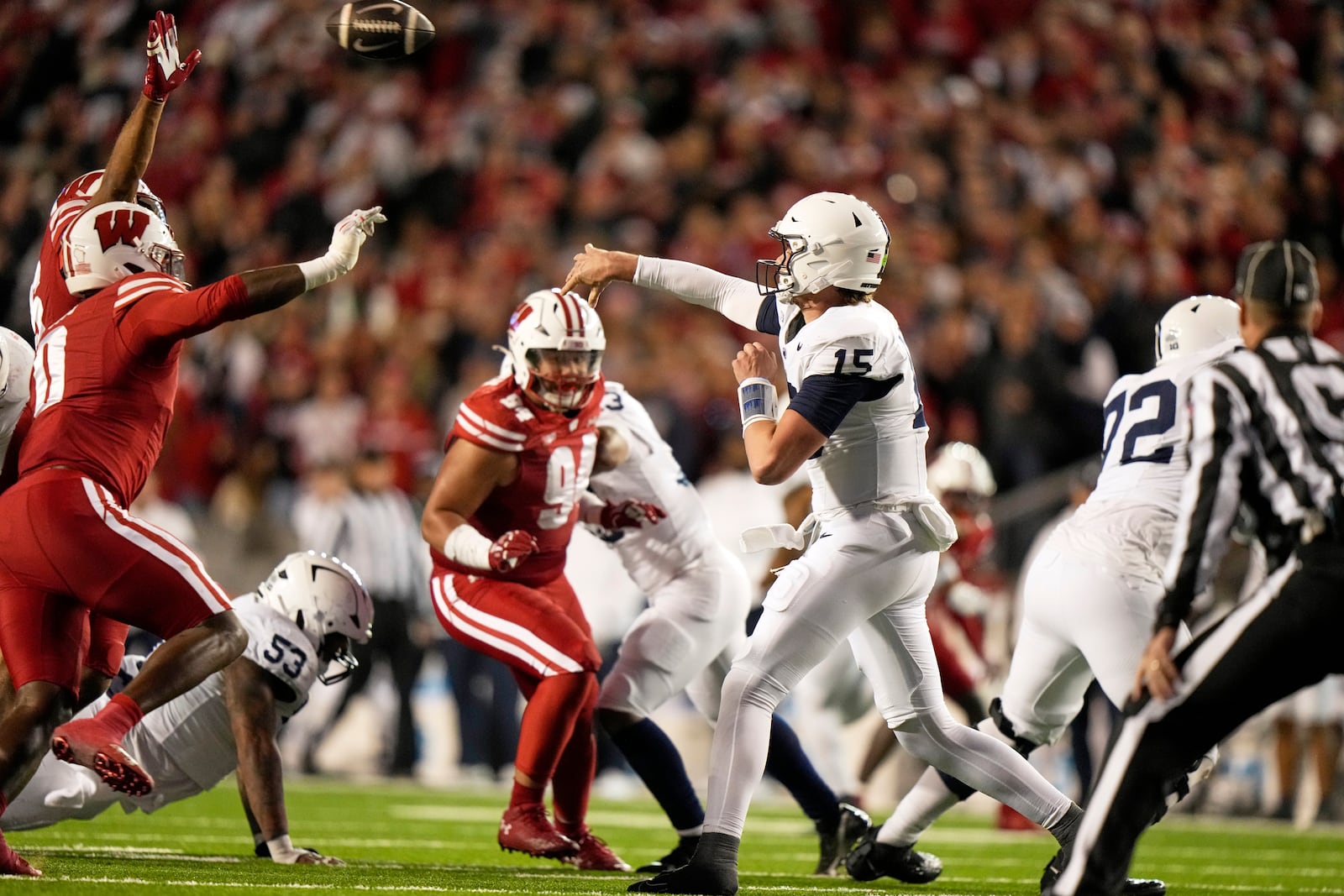 Penn State's Drew Allar (15) throws during the first half of an NCAA college football game against the WisconsinSaturday, Oct. 26, 2024, in Madison, Wis. (AP Photo/Morry Gash)