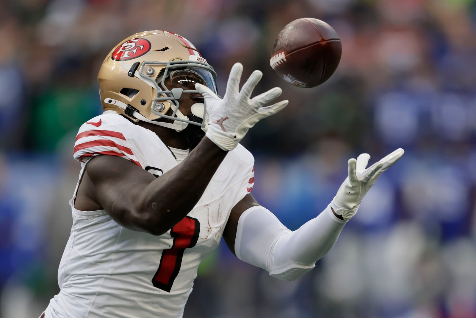 San Francisco 49ers wide receiver Deebo Samuel Sr. males catch during the first half of an NFL football game against the Seattle Seahawks, Thursday, Oct. 10, 2024, in Seattle. (AP Photo/John Froschauer)