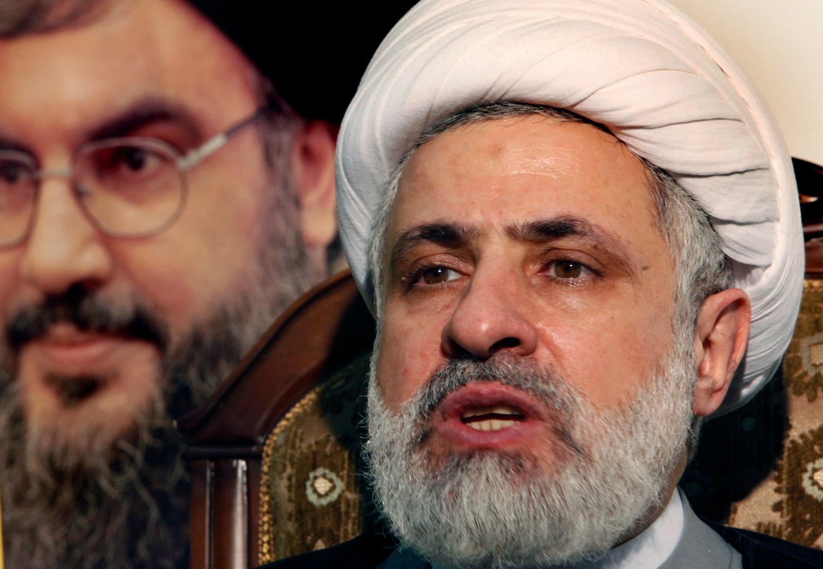 FILE - The deputy chief of Hezbollah, Sheik Naim Kassem, speaks during an interview with the Associated Press in the southern suburb of Beirut, Lebanon, Tuesday June 2, 2009. (AP Photo/Hussein Malla, File)