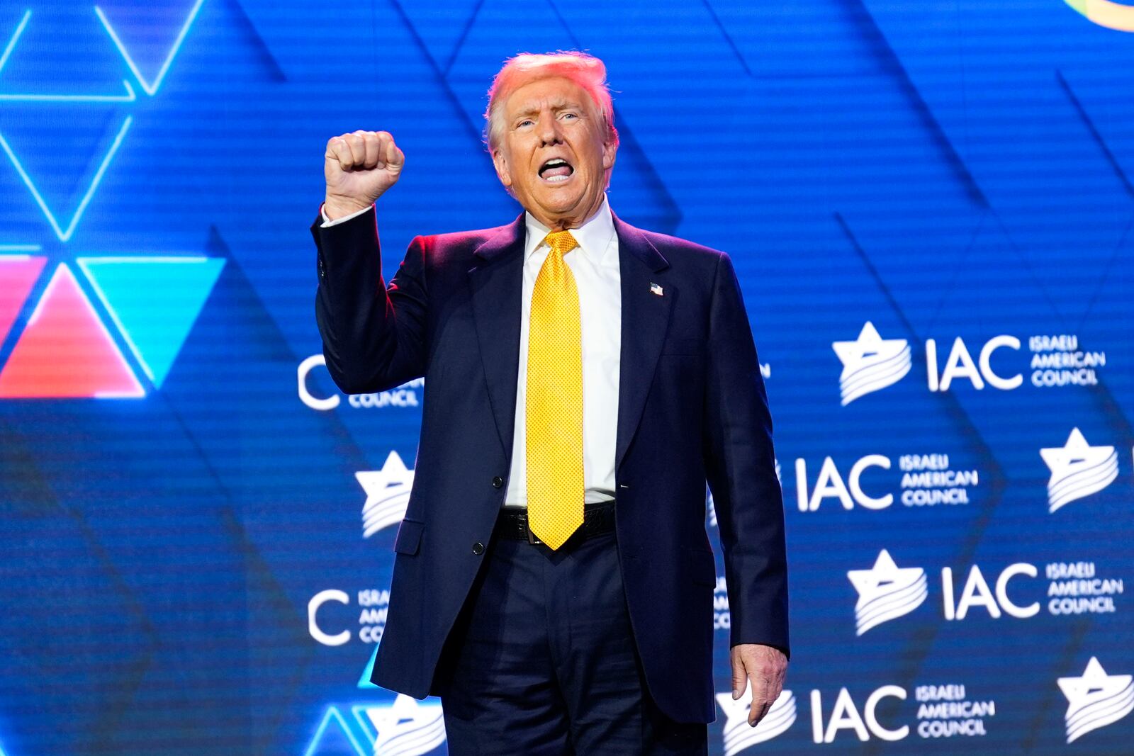 Republican presidential nominee former President Donald Trump acknowledges the crowd after speaking at the Israeli American Council National Summit, Thursday, Sept. 19, 2024, in Washington. (AP Photo/Evan Vucci)