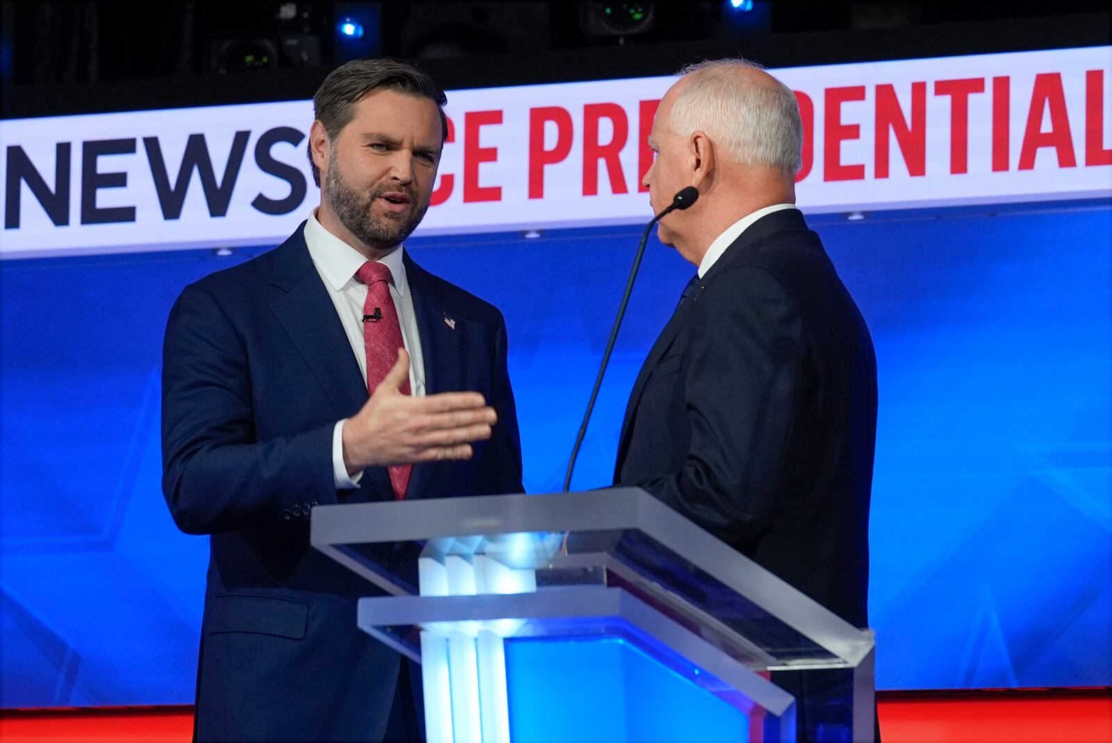 Republican vice presidential nominee Sen. JD Vance, R-Ohio, talks with Democratic vice presidential candidate Minnesota Gov. Tim Walz after the vice presidential debate hosted by CBS News Tuesday, Oct. 1, 2024, in New York. (AP Photo/Matt Rourke)