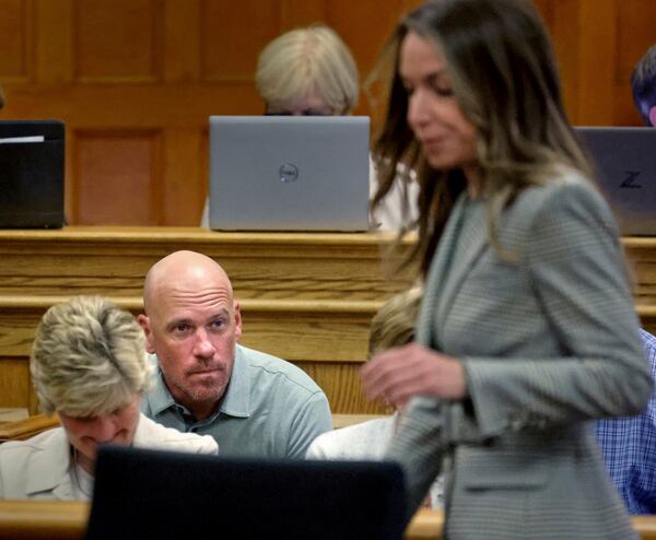 Paul O'Keefe, brother of the late John O'Keefe, watches as Karen Read walks by during her trial at Norfolk Superior Court, Tuesday, May 6, 2025, in Dedham, Mass. (Matt Stone/The Boston Herald via AP, Pool)