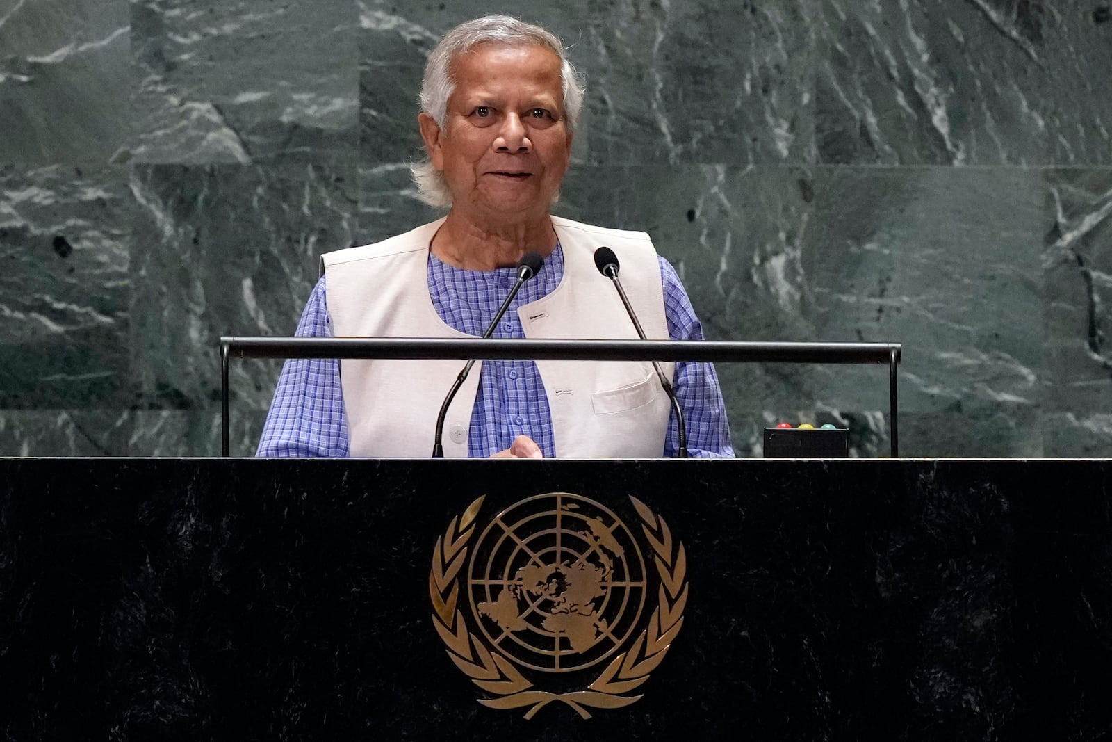 Chief Adviser of the interim government of Bangladesh Muhammad Yunus addresses the 79th session of the United Nations General Assembly, Friday, Sept. 27, 2024. (AP Photo/Richard Drew)