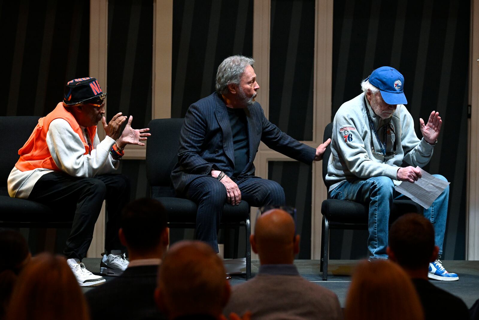 Businessman Alan Horwitz, right, reacts while speaking as film director Spike Lee, left, and comedian Billy Crystal, center, looks on as they are all honored at a superfan ceremony at the Basketball Hall of Fame, Sunday, Oct. 13, 2024, in Springfield, Mass. Horwitz, Lee, Crystal and actor Jack Nicholson are being added to the Naismith Memorial Basketball Hall of Fame's James F. Goldstein SuperFan Gallery. (AP Photo/Jessica Hill)