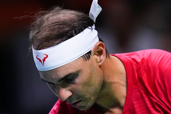 Spain's tennis player Rafael Nadal competes against Netherlands' Botic Van De Zandschulp during a Davis Cup quarterfinal match at Martin Carpena Sports Hall in Malaga, southern Spain, on Tuesday, Nov. 19, 2024. (AP Photo/Manu Fernandez)