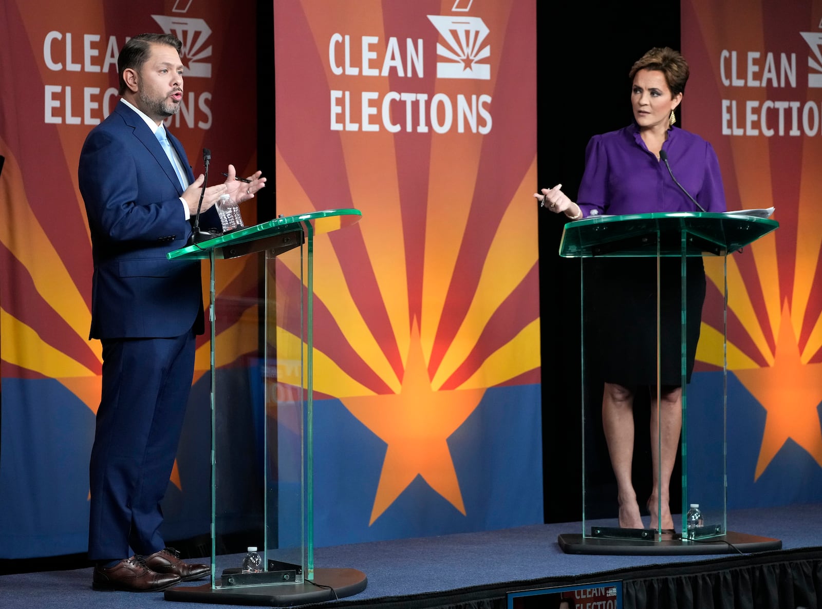 U.S. Senate candidates Rep. Ruben Gallego, D-Ariz., left, and Republican challenger Kari Lake participate in their debate, Wednesday, Oct. 9, 2024, in Phoenix. (Cheryl Evans/Arizona Republic via AP)