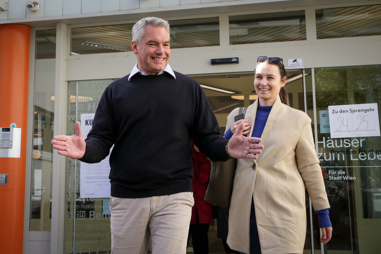 Austrian Chancellor Karl Nehammer smiles while exiting a polling station in Vienna, Austria, Sunday, Sept. 29, 2024, after casting his vote in the country's national election. (AP Photo/Heinz-Peter Bader)