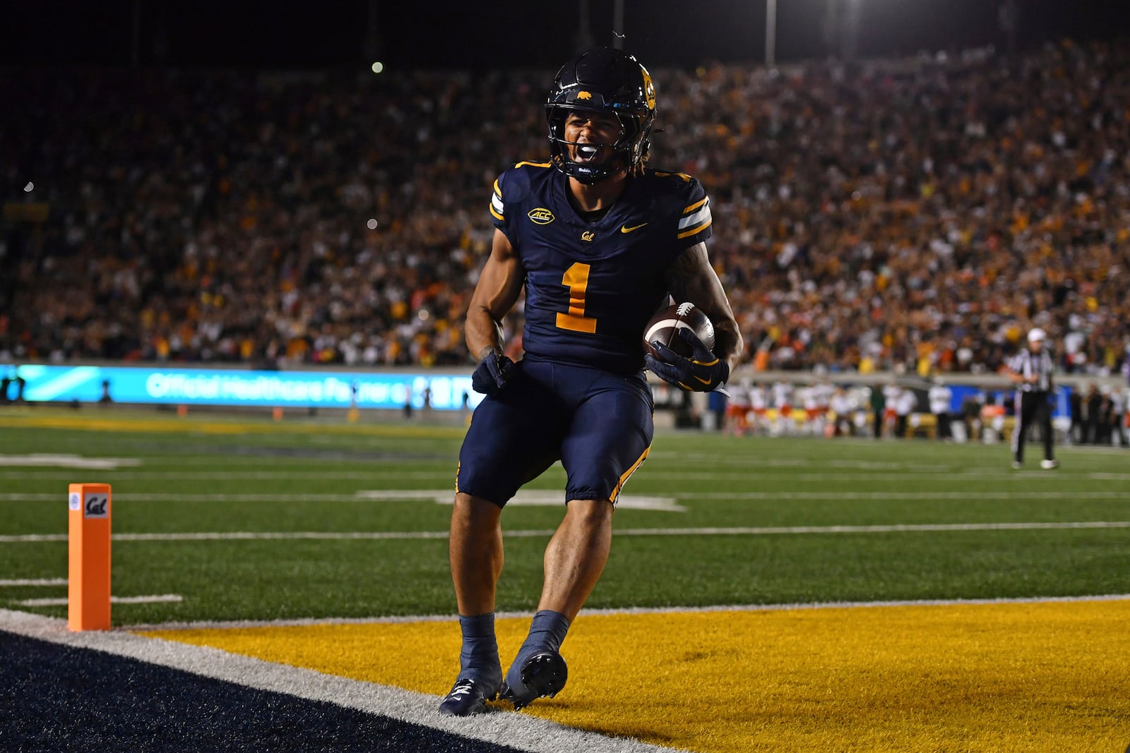 California running back Jaydn Ott (1) scores a touchdown against the Miami during the second quarter of their game at Memorial Stadium in Berkeley, Calif., on Saturday, Oct. 5, 2024. (Jose Carlos Fajardo/Bay Area News Group via AP)