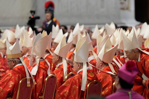 Cardinals attend a final Mass St. Peter's Basilica, before the conclave to elect a new pope, at the Vatican, Wednesday, May 7, 2025. (AP Photo/Gregorio Borgia)