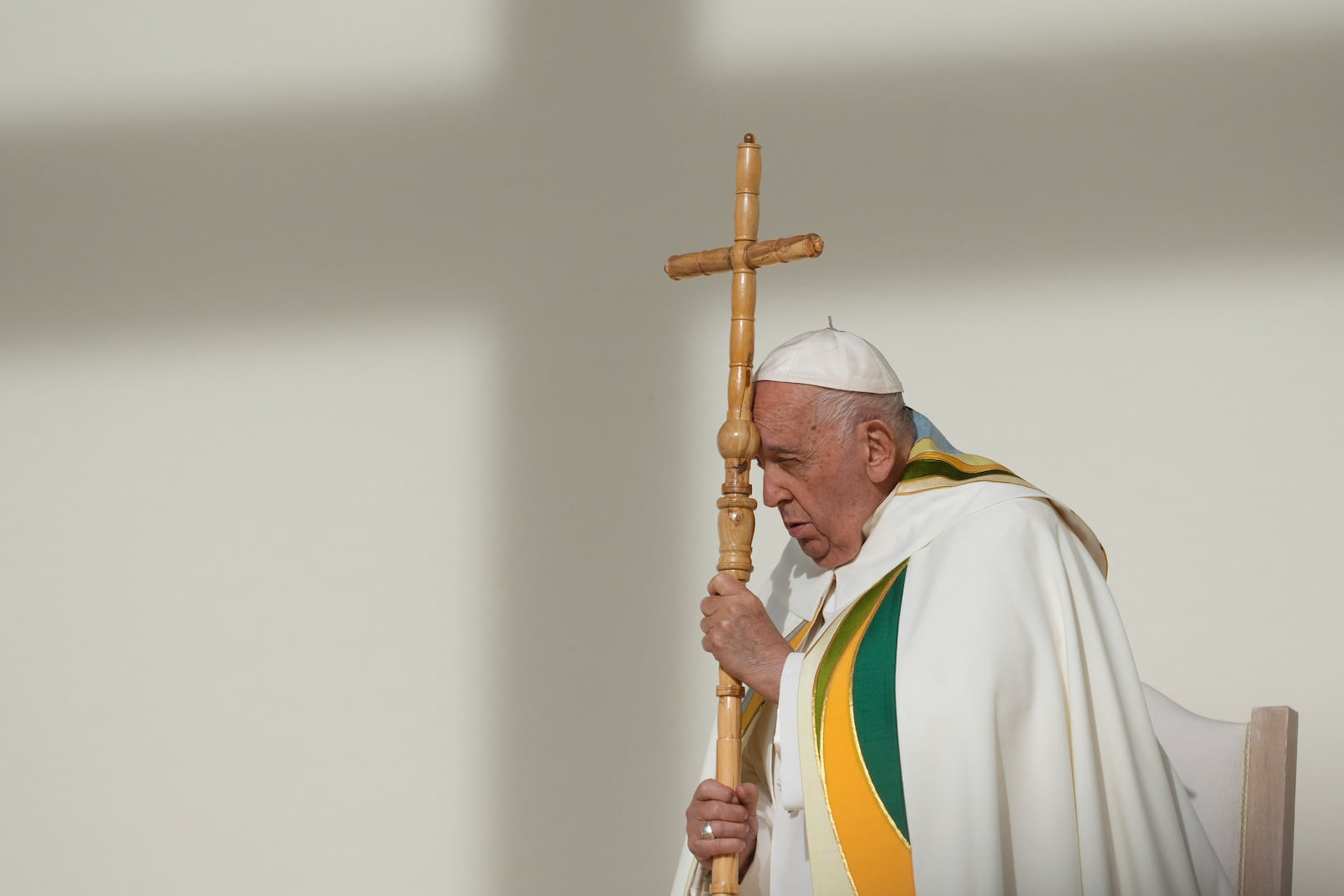 Pope Francis holds the pastoral staff as he presides over the Sunday mass at King Baudouin Stadium, in Brussels Sunday, Sept. 29, 2024. (AP Photo/Andrew Medichini)