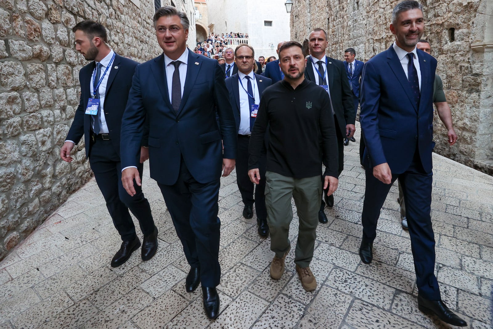 Ukrainian President Volodomyr Zelenskyy, center right, walks through the old town with Dubrovnik Mayor Mato Frankovic, right, and Croatian Prime Minister Andrej Plenkovic during pause of the Southeast Europe Croatia Ukraine summit in Dubrovnik, Croatia, Wednesday, Oct. 9, 2024. (AP Photo)