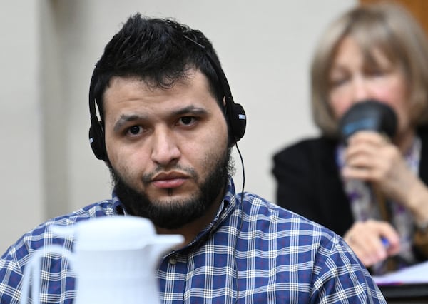 Jose Ibarra, accused of killing a Georgia nursing student earlier this year, listens through an interpreter during his trial at Athens-Clarke County Superior Court, Friday, Nov. 15, 2024, in Athens, Ga. (Hyosub Shin/Atlanta Journal-Constitution via AP, Pool)