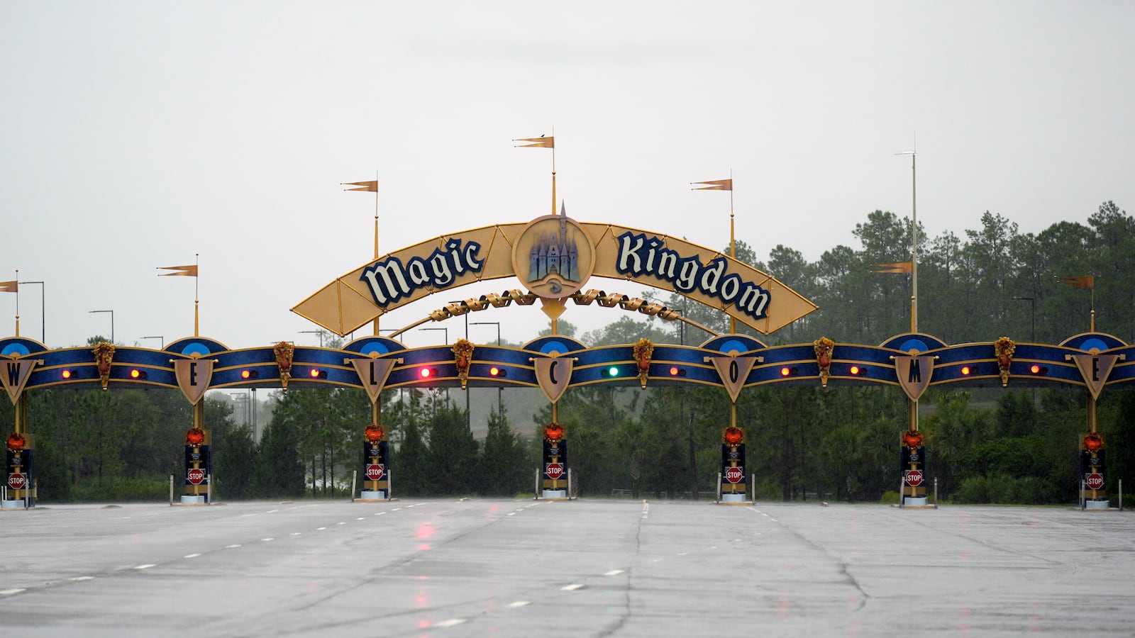 The entrance to the Magic Kingdom theme park is shown empty shortly before they closed because of the arrival of Hurricane Milton, Wednesday, Oct. 9, 2024, in Lake Buena Vista, Fla. (AP Photo/John Raoux)