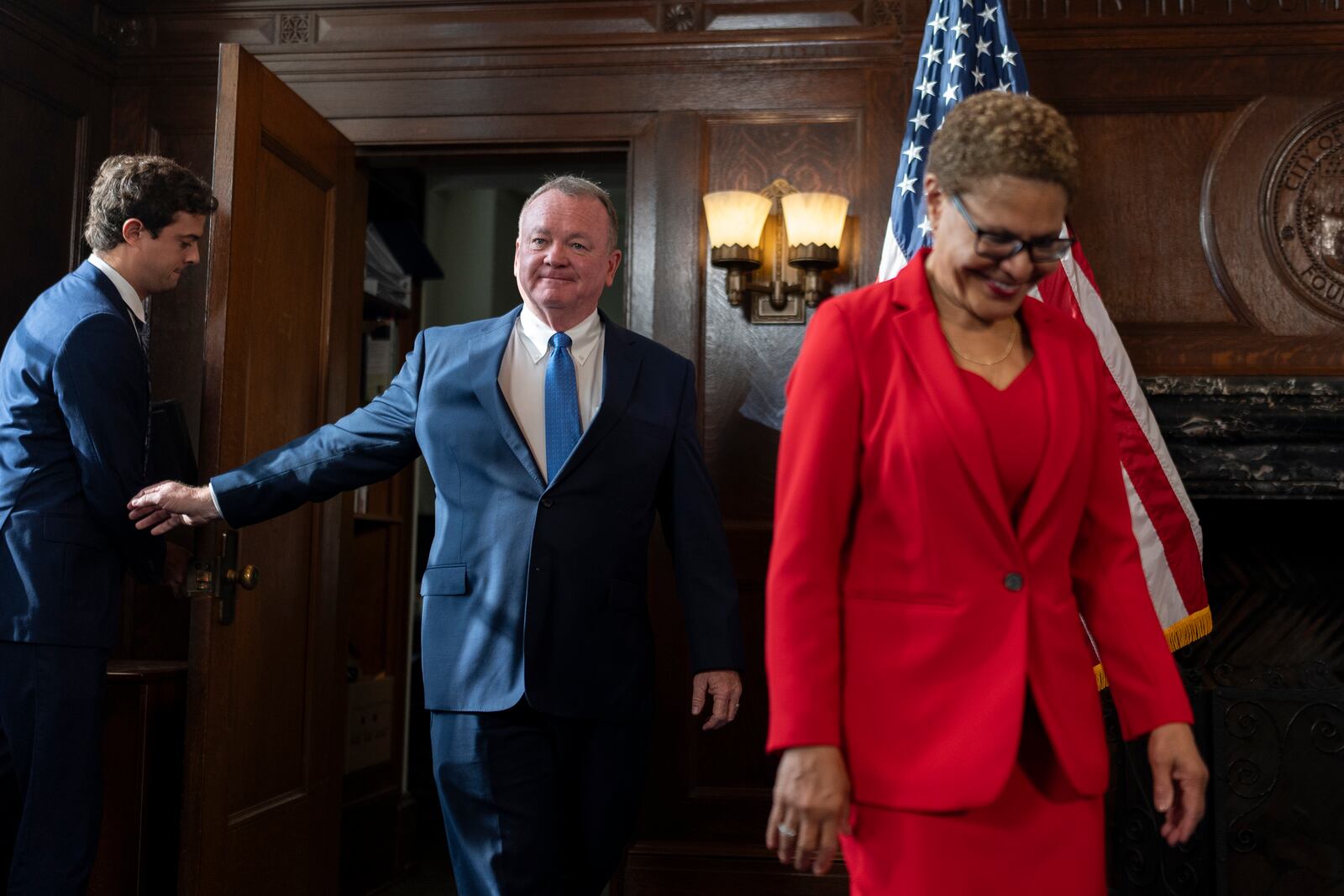 Los Angeles Mayor Karen Bass, right, and newly appointed police chief Jim McDonnell, center, arrive for a news conference in Los Angeles, Friday, Oct. 4, 2024. (AP Photo/Jae C. Hong)