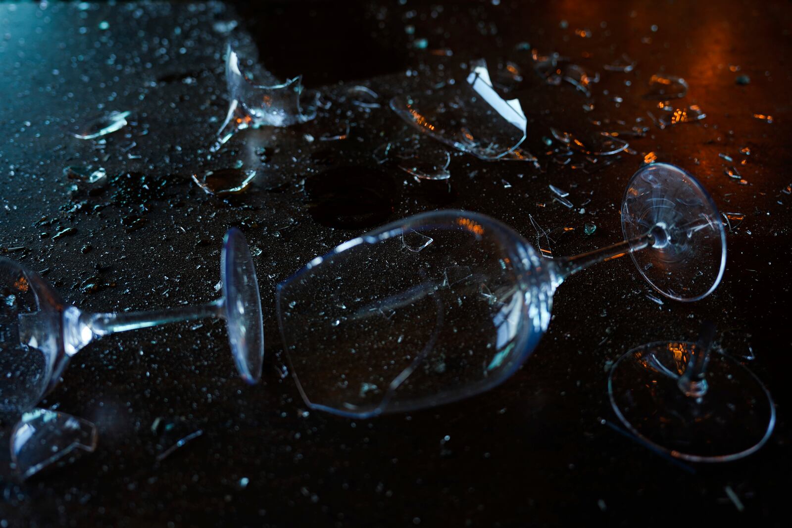 Broken wine glasses are seen in a damaged restaurant that was hit during Iran's missile attack in Tel Aviv, Israel, Wednesday, Oct. 2, 2024. (AP Photo/Ariel Schalit)